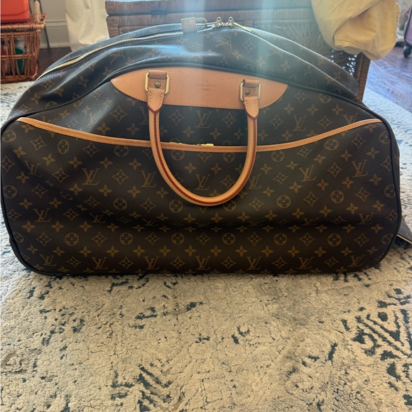 Louis Vuitton canvas rolling duffle bag, gently used. - Picture 11 of 14